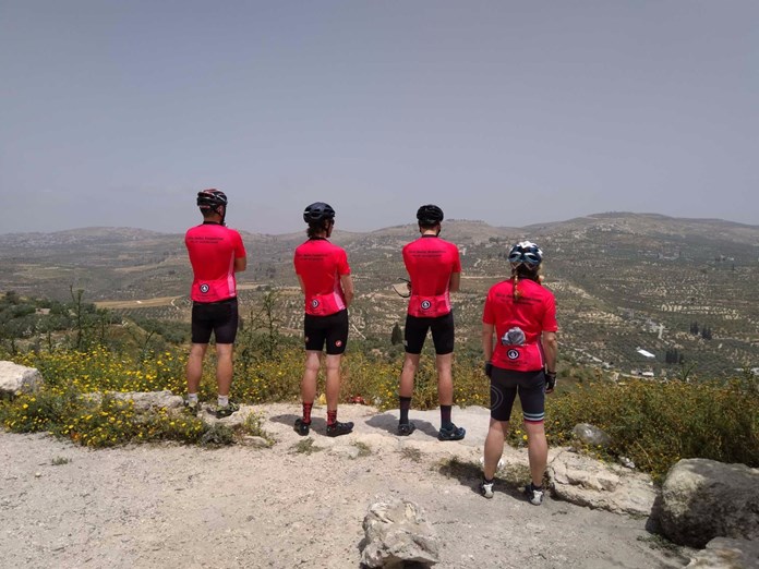 Four Amos Road Club members taking in the view across the West Bank.
