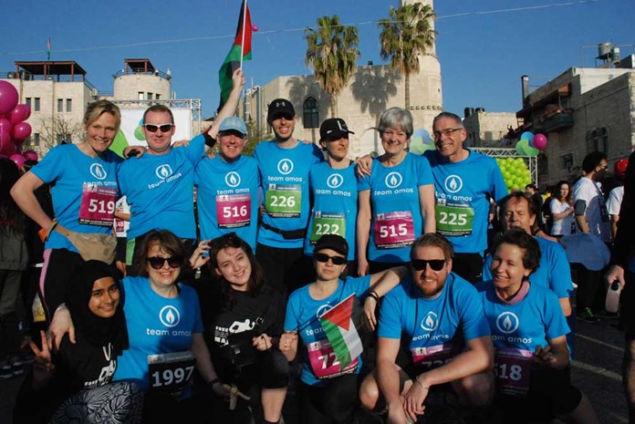 Members of Team Amos at the start line for the 2017 Palestine Marathon.