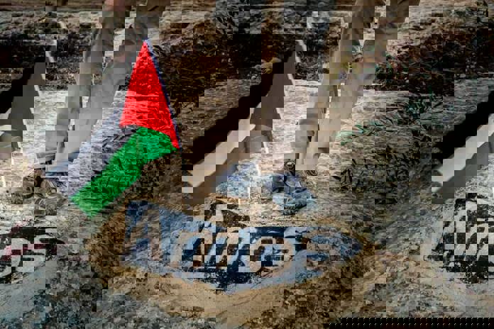 The word 'Amos' painted into a rock at the Sumud Peace Camp in the South Hebron Hills.