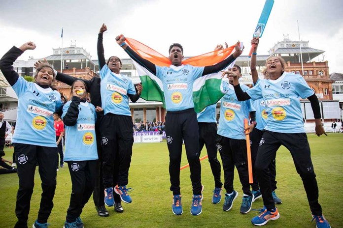 Young people from Karunalaya in Chennai, India celebrate after winning the Street Child Cricket World Cup at Lords.