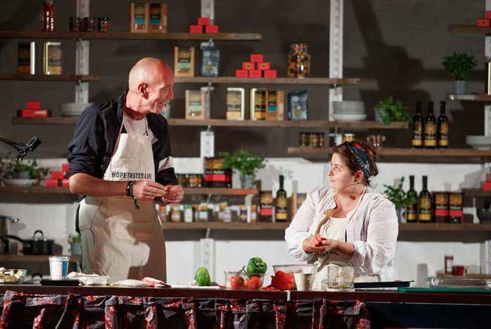 Chris Rose from Amos Trust and Phoebe Rison from the Olive Tree Kitchen at Greenbelt Festival 2019