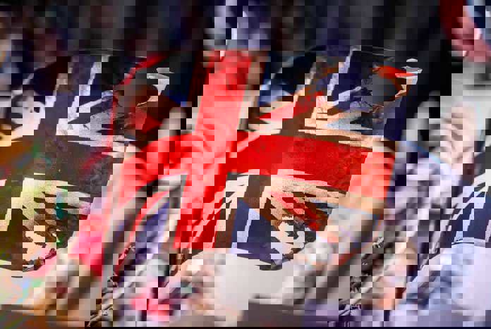 A burnt-out toy Union Jack flag.