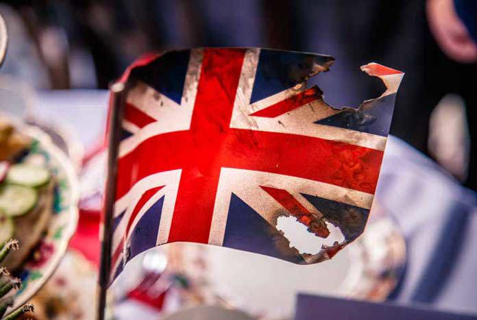 A burnt-out toy Union Jack flag.