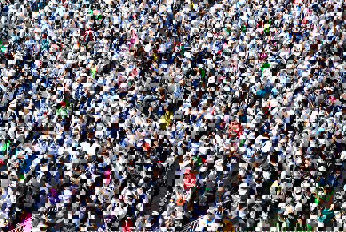 A crowd of runners gather at the start of the Palestine Marathon in Bethlehem.