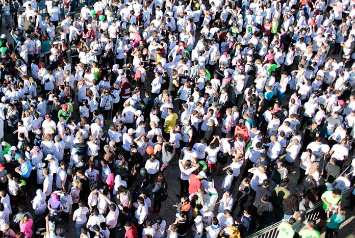 A crowd of runners at the start line of the Palestine Marathon.