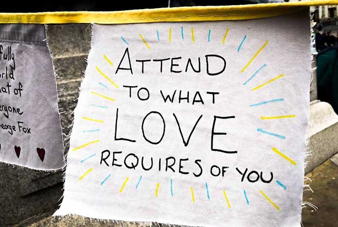 A banner reads, "Attend to what love requires of you."