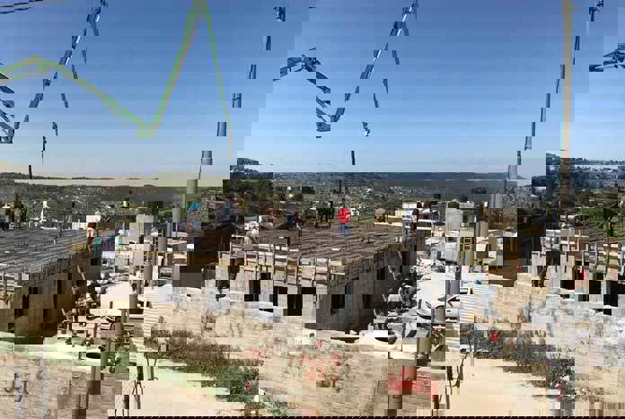 A demolished Palestinian home being rebuilt in the West Bank.