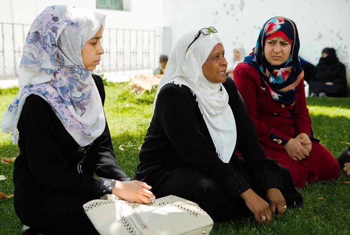 A group of women chatting in the garden of Al Ahli Arab Hospital in Gaza City.
