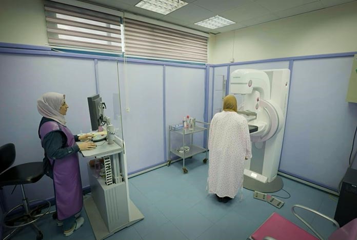 A woman in Gaza receives breast cancer screening at Al Ahli Arab Hospital.