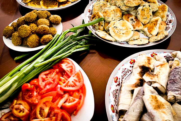 A table full of delicious Palestinian food.