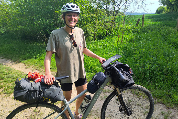 Meg Williams from Amos Trust with her bike.