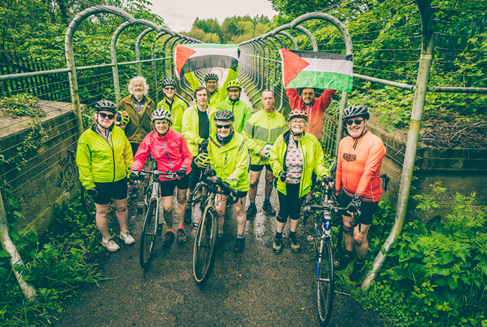 Amos Road Club members with their Palestinian flags.