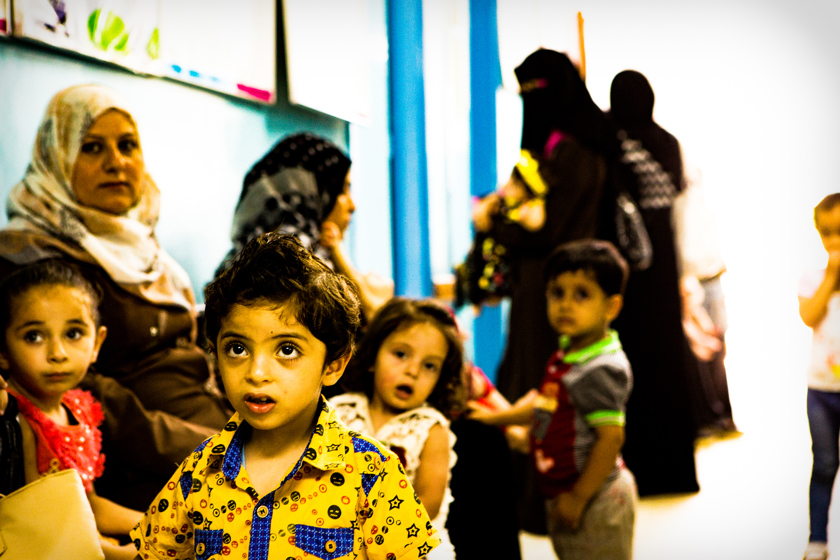 Young children attending a health clinic in Gaza City.