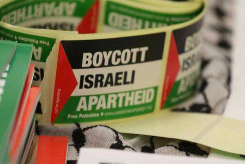 A rol of stickers that read, "Boycott Israeli Apartheid."